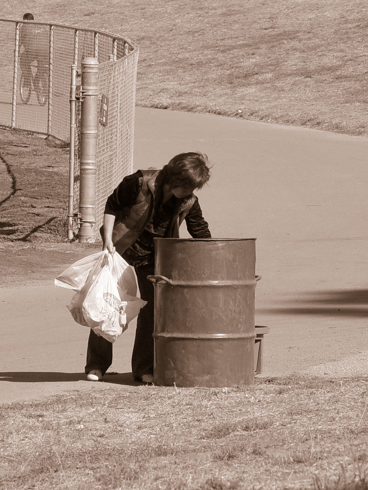An Internet Chronicle writer forages for food from an unsecured trash receptacle in this undated photograph taken near Cuthbert, Georgia.